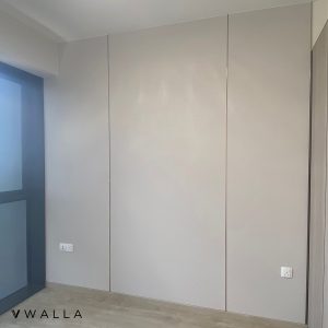 Grey Fabric paneled bedroom feature wall